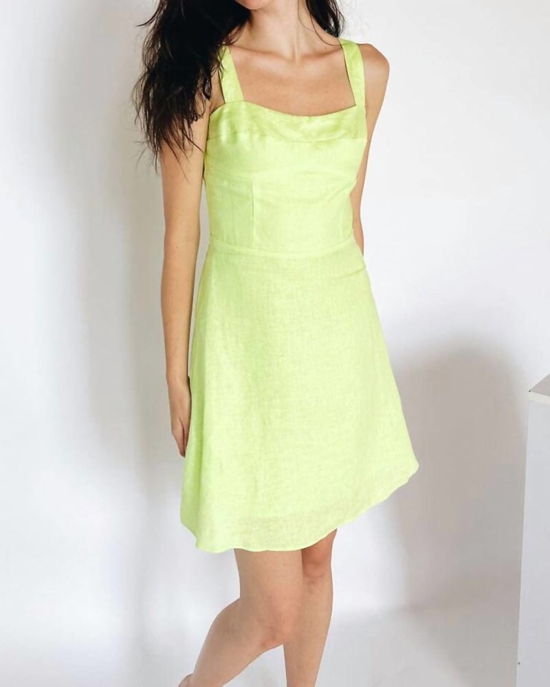 Front of a model wearing a size L Malibu Mini Dress in Lime in Lime by Lucy Paris. | dia_product_style_image_id:346846